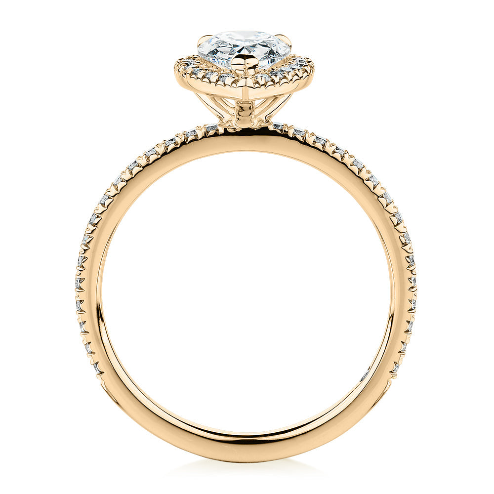 Signature Simulant Diamond 1.37 carat* TW pear and round brilliant halo engagement ring in 10 carat yellow gold