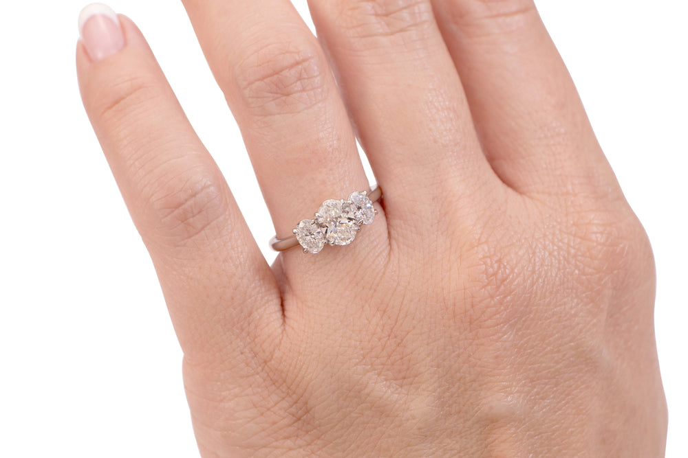 Signature Simulant Diamond 1.87 carat* TW oval three stone ring in 14 carat white gold