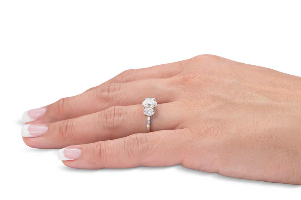 Signature Simulant Diamond 1.87 carat* TW oval three stone ring in 14 carat white gold