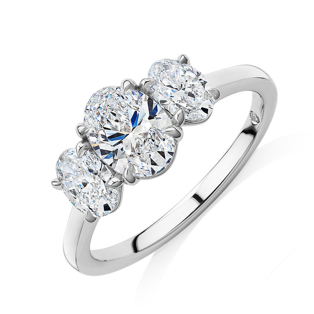 Signature Simulant Diamond 1.87 carat* TW oval three stone ring in 14 carat white gold
