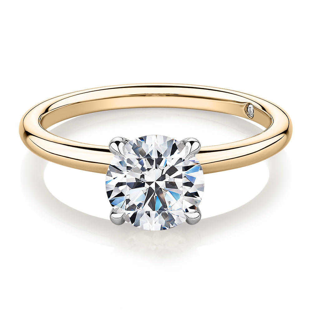 Signature Simulant Diamond 1.50 carat* round brilliant solitaire engagement ring in 10 carat yellow and white gold