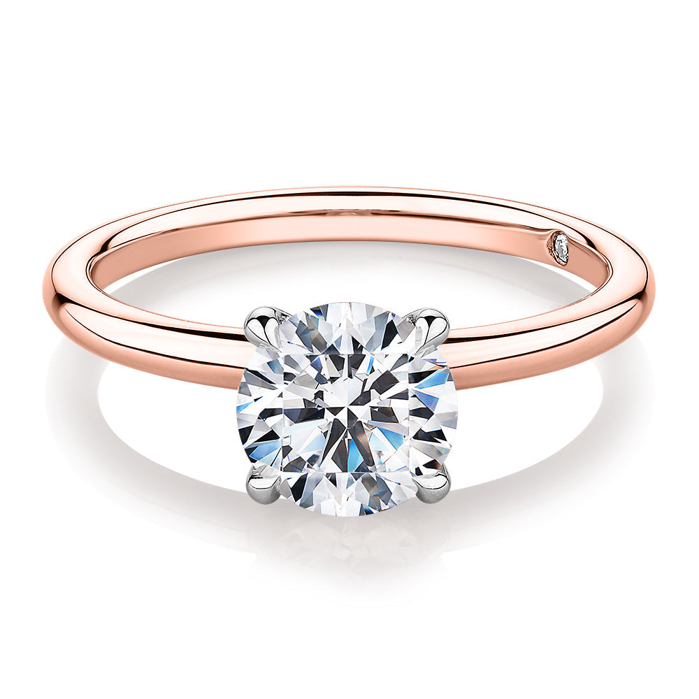 Signature Simulant Diamond 1.50 carat* round brilliant solitaire engagement ring in 10 carat rose and white gold