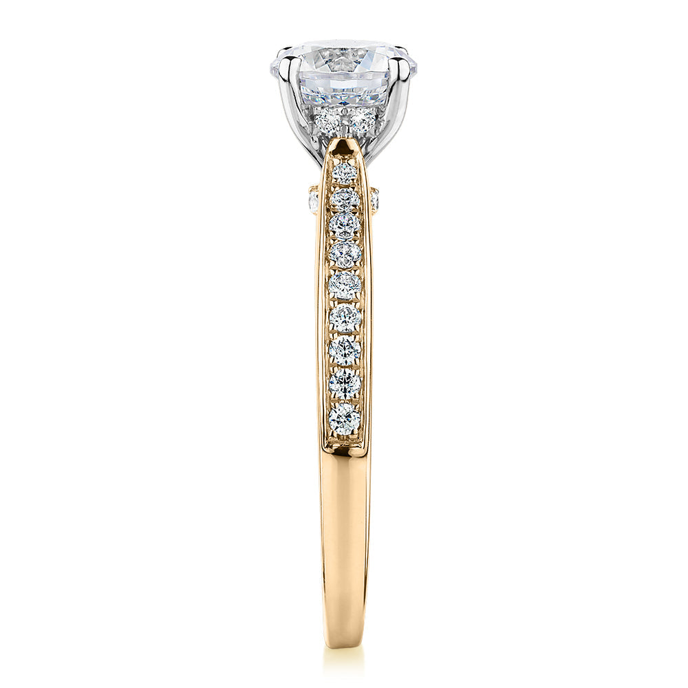 Signature Simulant Diamond 1.40 carat* TW round brilliant shouldered solitaire engagement ring in 10 carat yellow and white gold