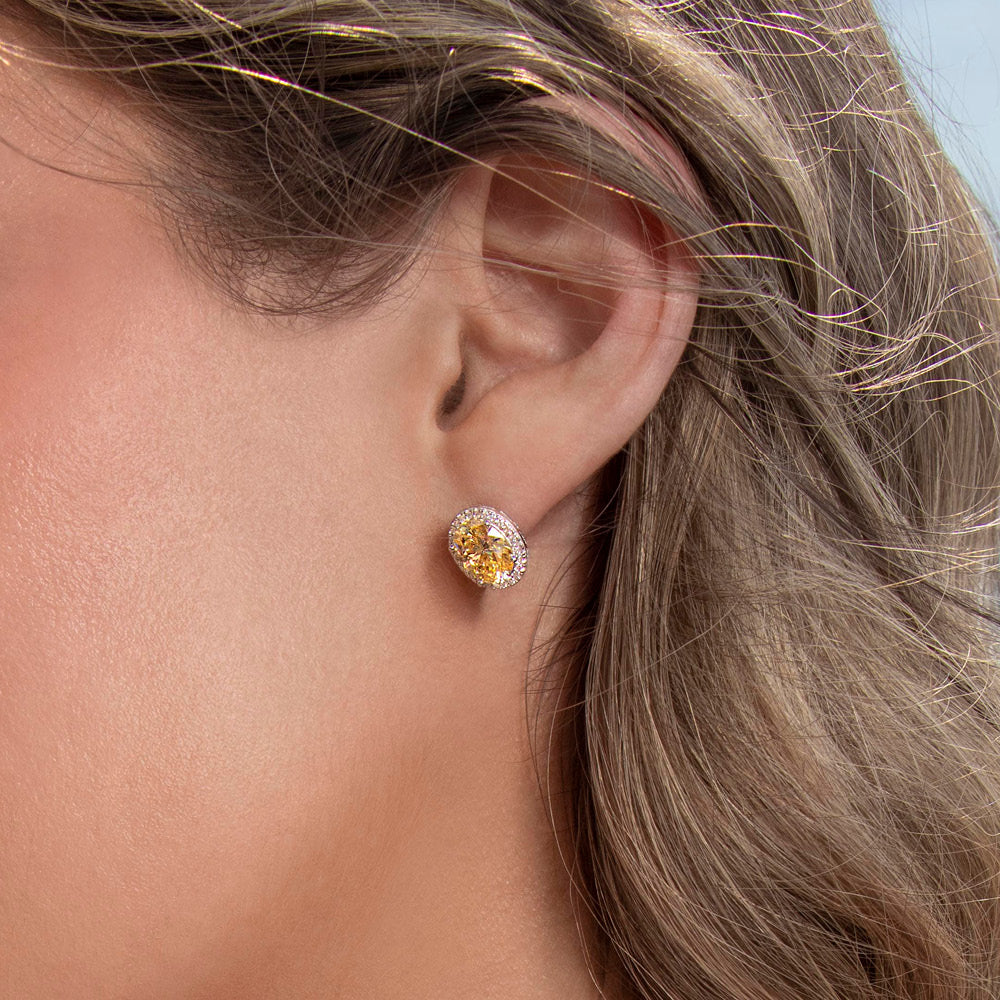 Oval and Round Brilliant halo stud earrings with 4.06 carats* of diamond simulants in sterling silver
