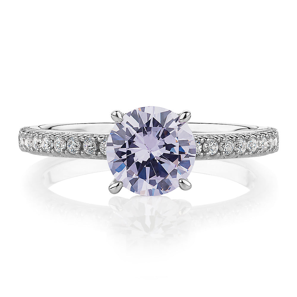 Dress ring with lavender simulant in sterling silver
