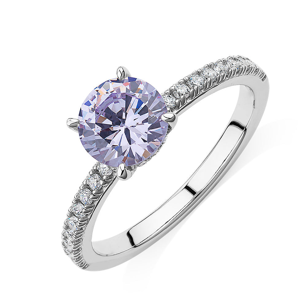 Dress ring with lavender simulant in sterling silver